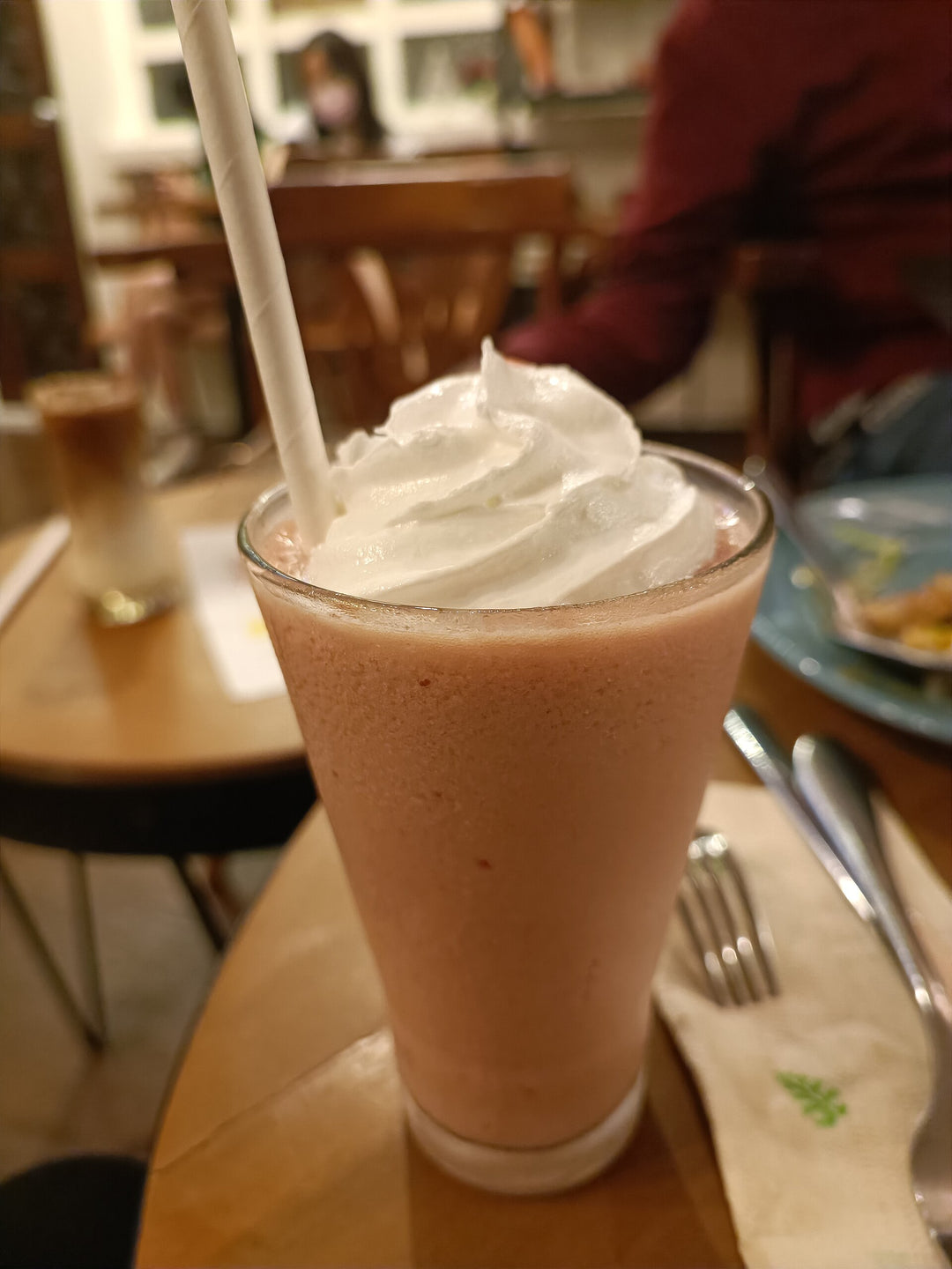Strawberry smoothie in a tall glass